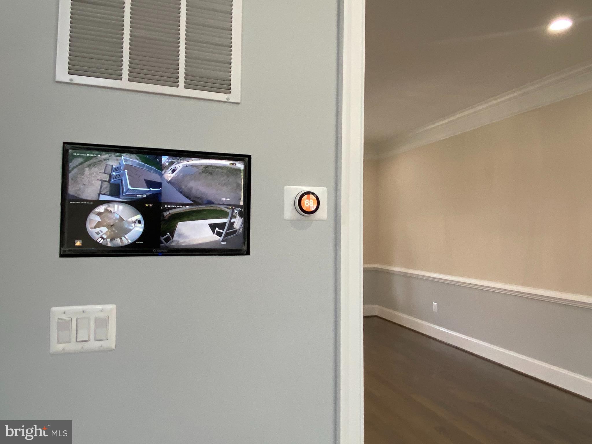 8712 Redman Street Springfield, VA 22153 - Photo 14 of 77 cameras monitor view n family room