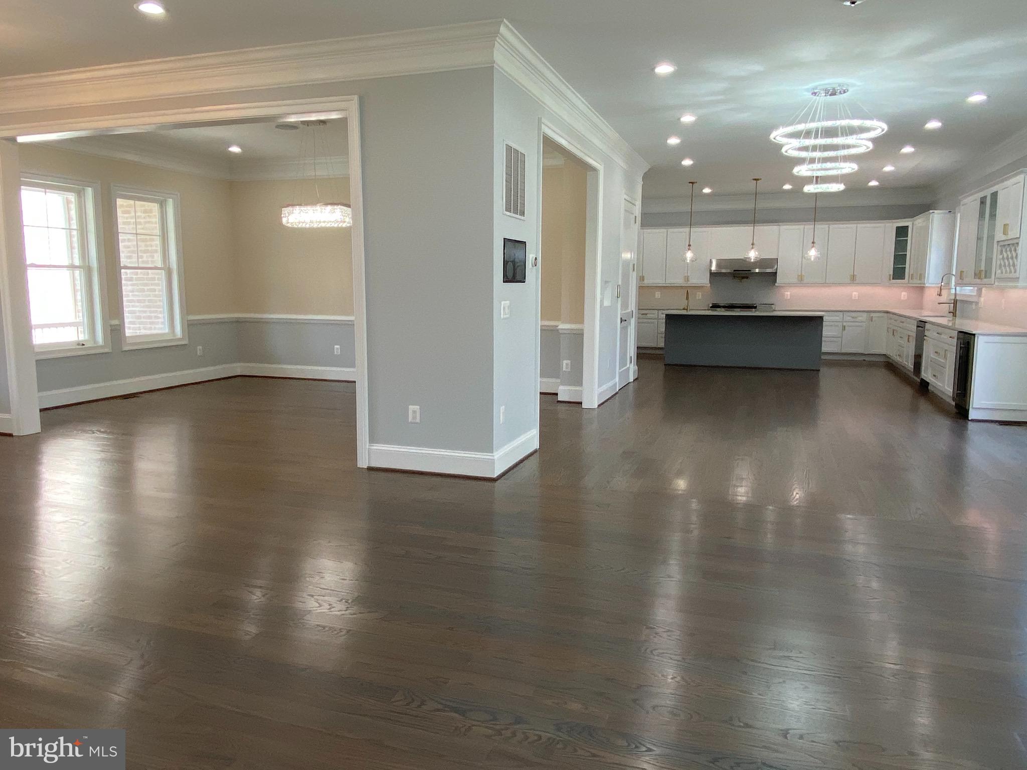 8712 Redman Street Springfield, VA 22153 - Photo 22 of 77 open view from family room showing dining rm