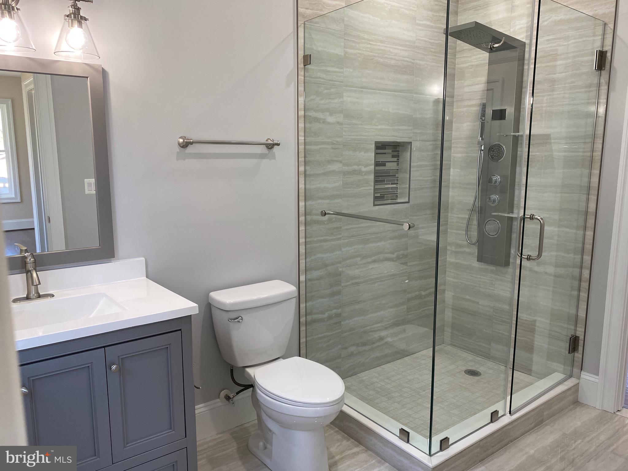 8712 Redman Street Springfield, VA 22153 - Photo 41 of 77 Bedroom & hallway bathroom