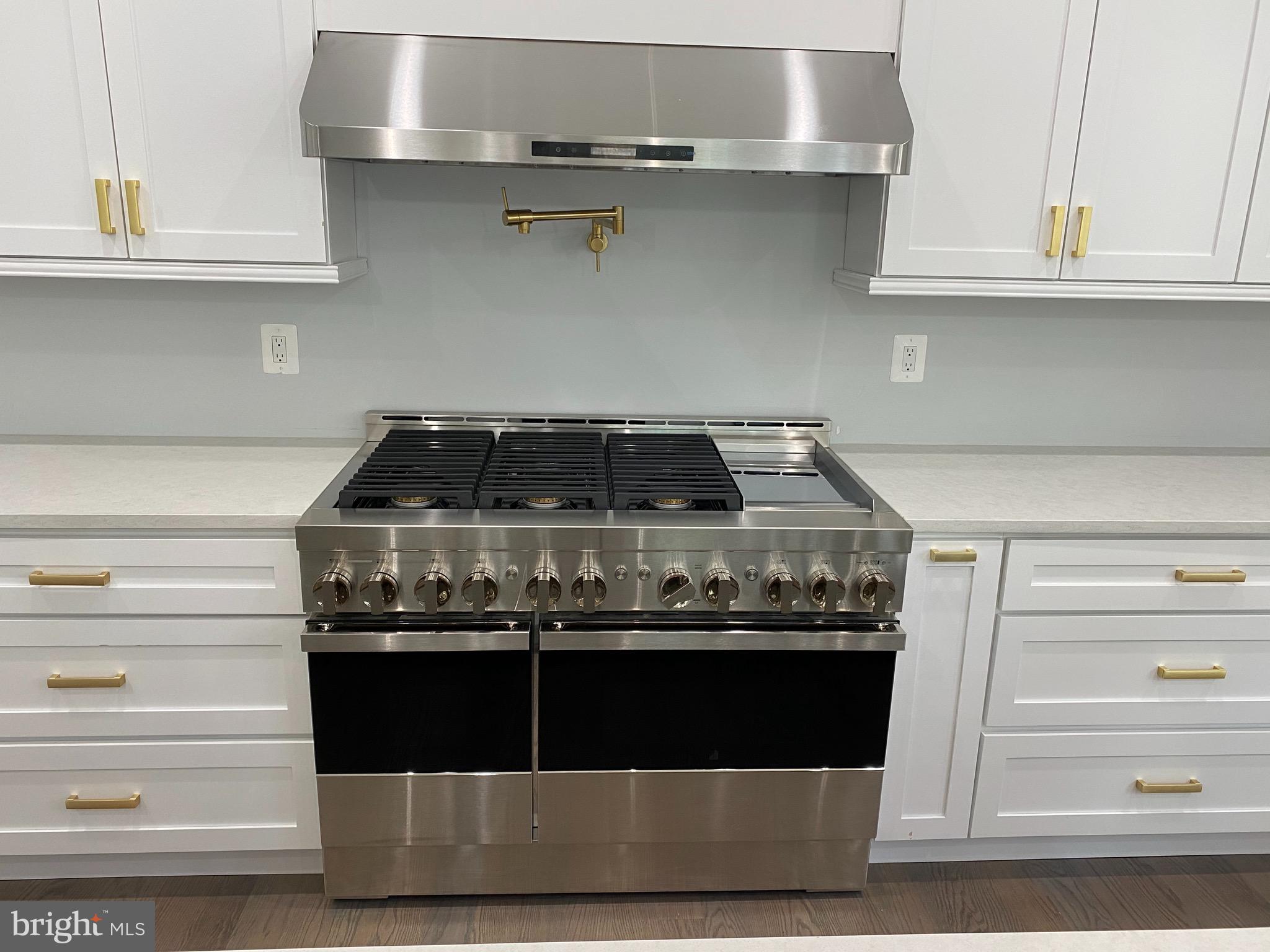 8712 Redman Street Springfield, VA 22153 - Photo 8 of 77 Chef's dream range, hood and pot filler