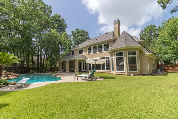 $1,010,000 | 1614 Lake Wilderness Lane, Houston, TX 77345