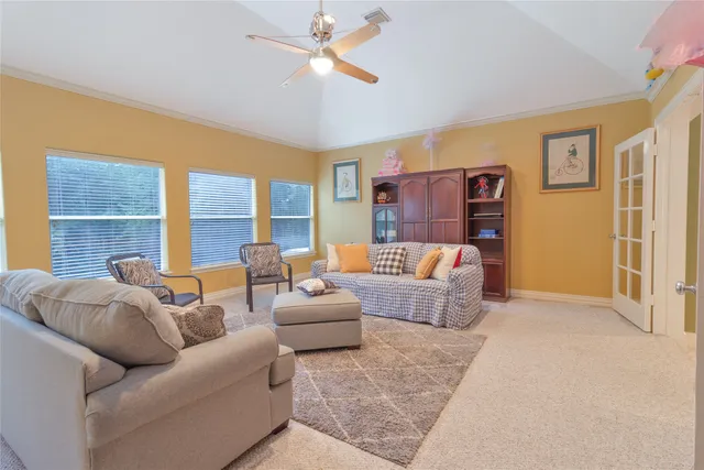 a bathroom with a shower and a glass door