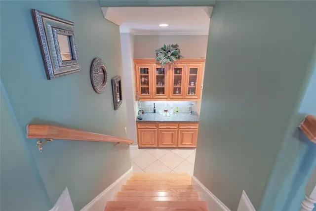 a view of workspace with wooden floor and windows