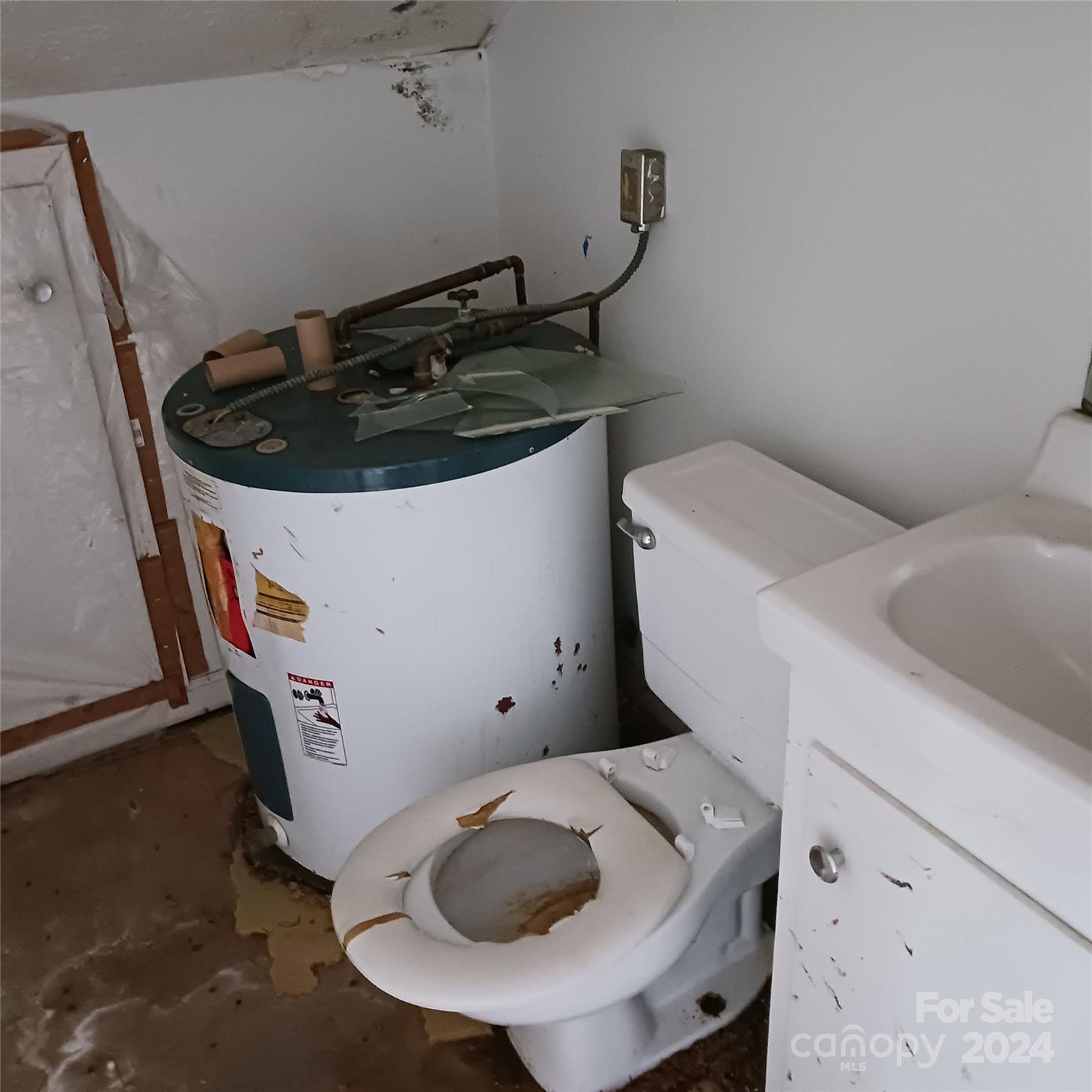 3116 Highway 70 Morganton, NC 28655 - Photo 12 of 13 a bathroom with a sink and toilet