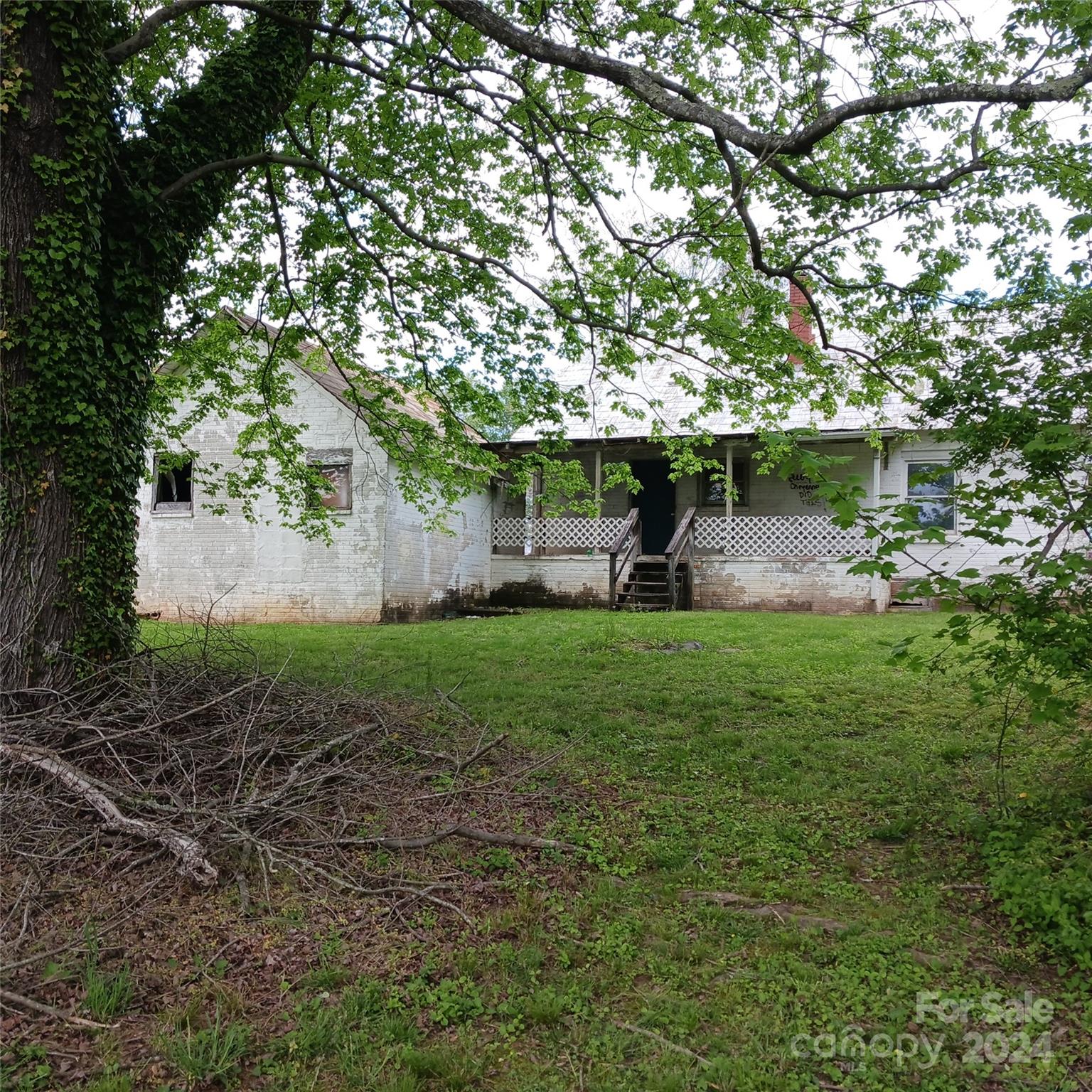 3116 Highway 70 Morganton, NC 28655 - Photo 3 of 13 a view of a backyard with garden