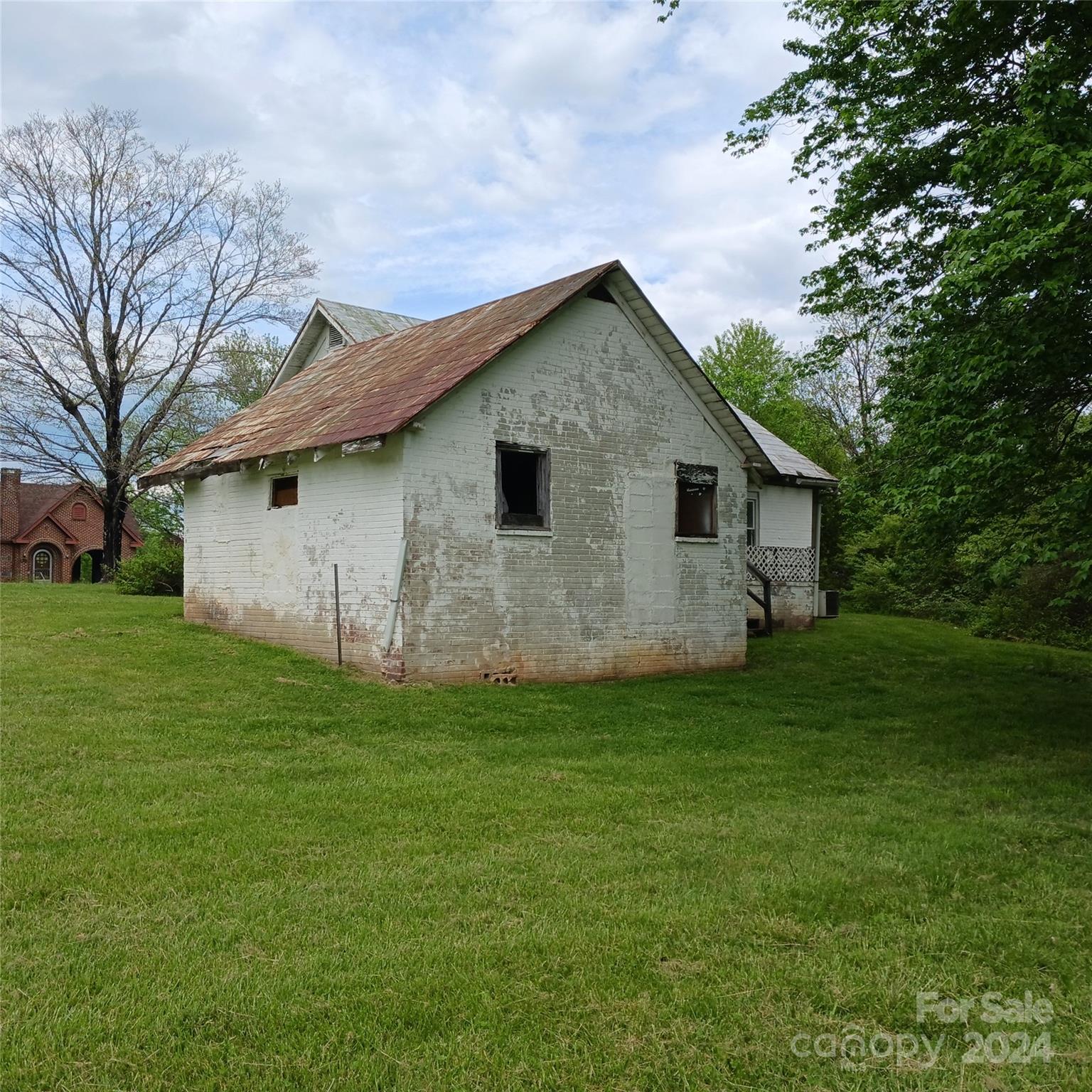 3116 Highway 70 Morganton, NC 28655 - Photo 4 of 13 a view of a house with a yard