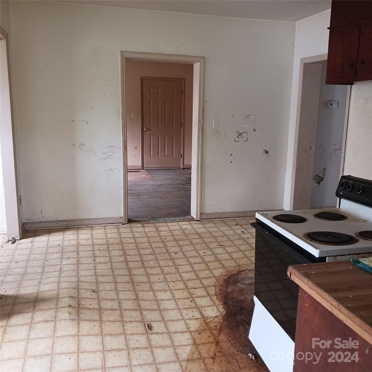 3116 Highway 70 Morganton, NC 28655 - Photo 5 of 13 a bedroom with a bed and a flat screen tv