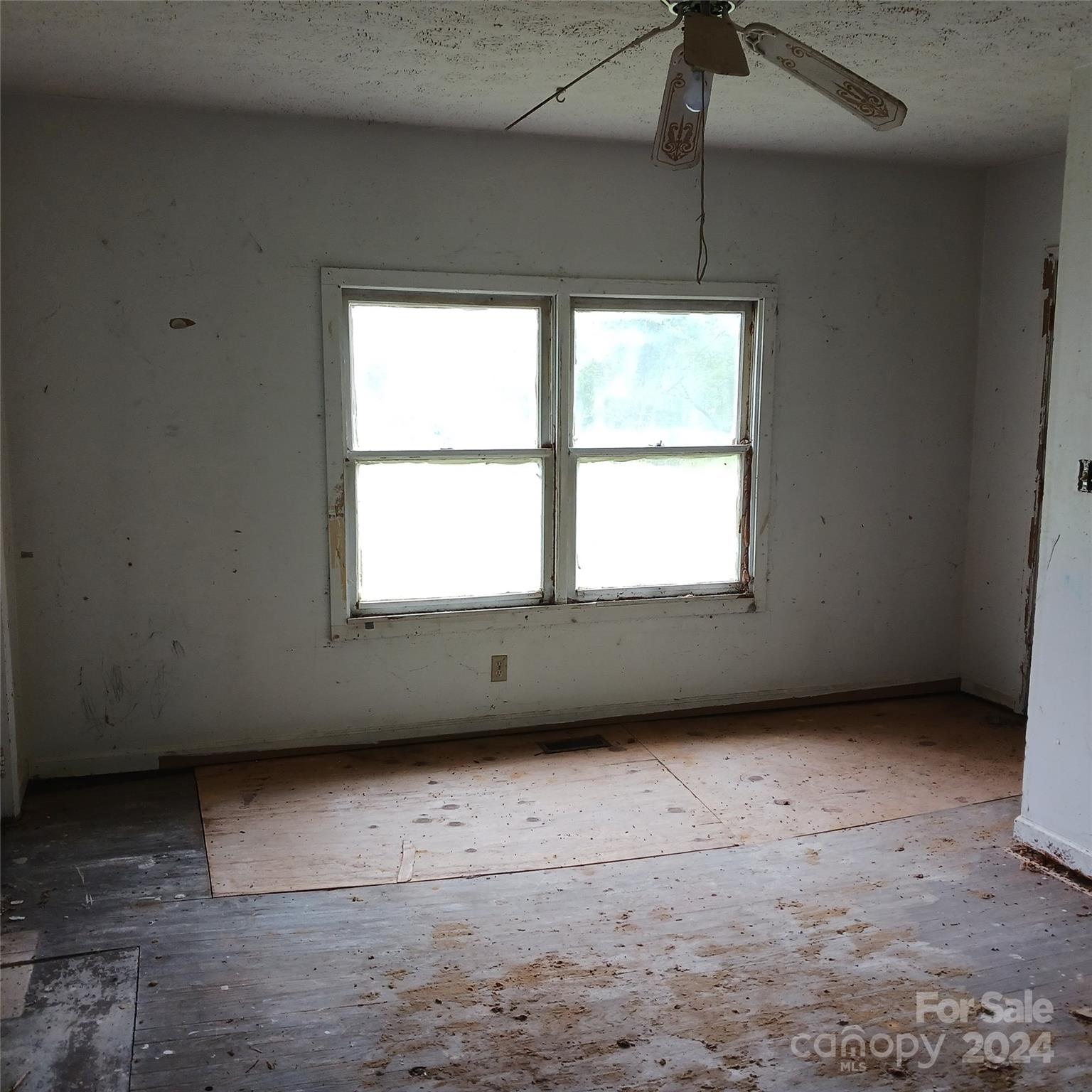 3116 Highway 70 Morganton, NC 28655 - Photo 7 of 13 a view of an empty room with a window