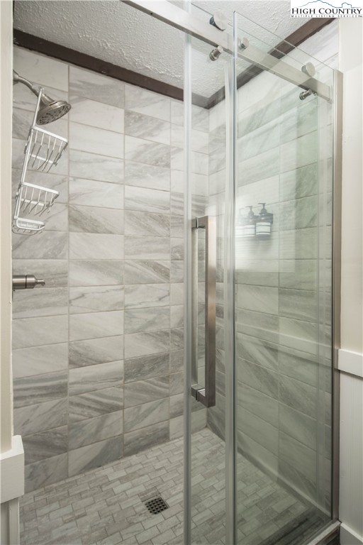 111 Pinnacle Ridge Road Beech Mountain, NC 28604 - Photo 24 of 50 a bathroom with a shower