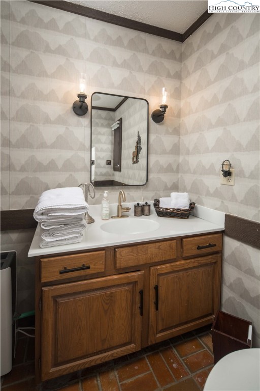 111 Pinnacle Ridge Road Beech Mountain, NC 28604 - Photo 40 of 50 a bathroom with a sink and a mirror