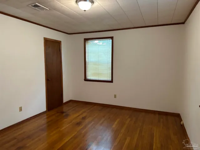 a bathroom with a toilet a sink and shower