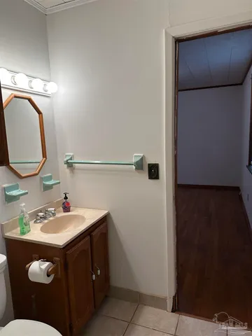 a view of a garden with sitting area