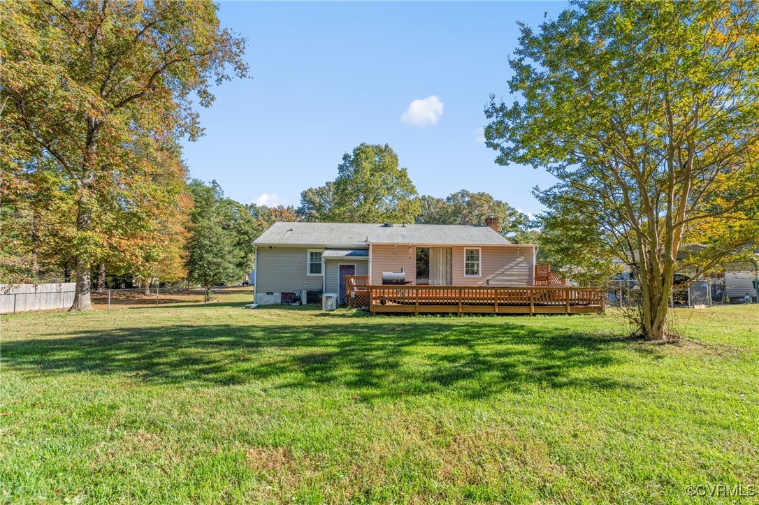 1202 Red Coach Lane Sandston, VA 23150 - Photo 15 of 16 a front view of a house with a garden