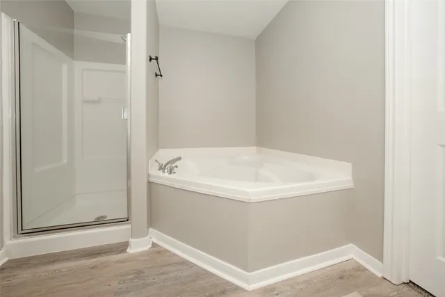a white bath tub sitting in a bathroom