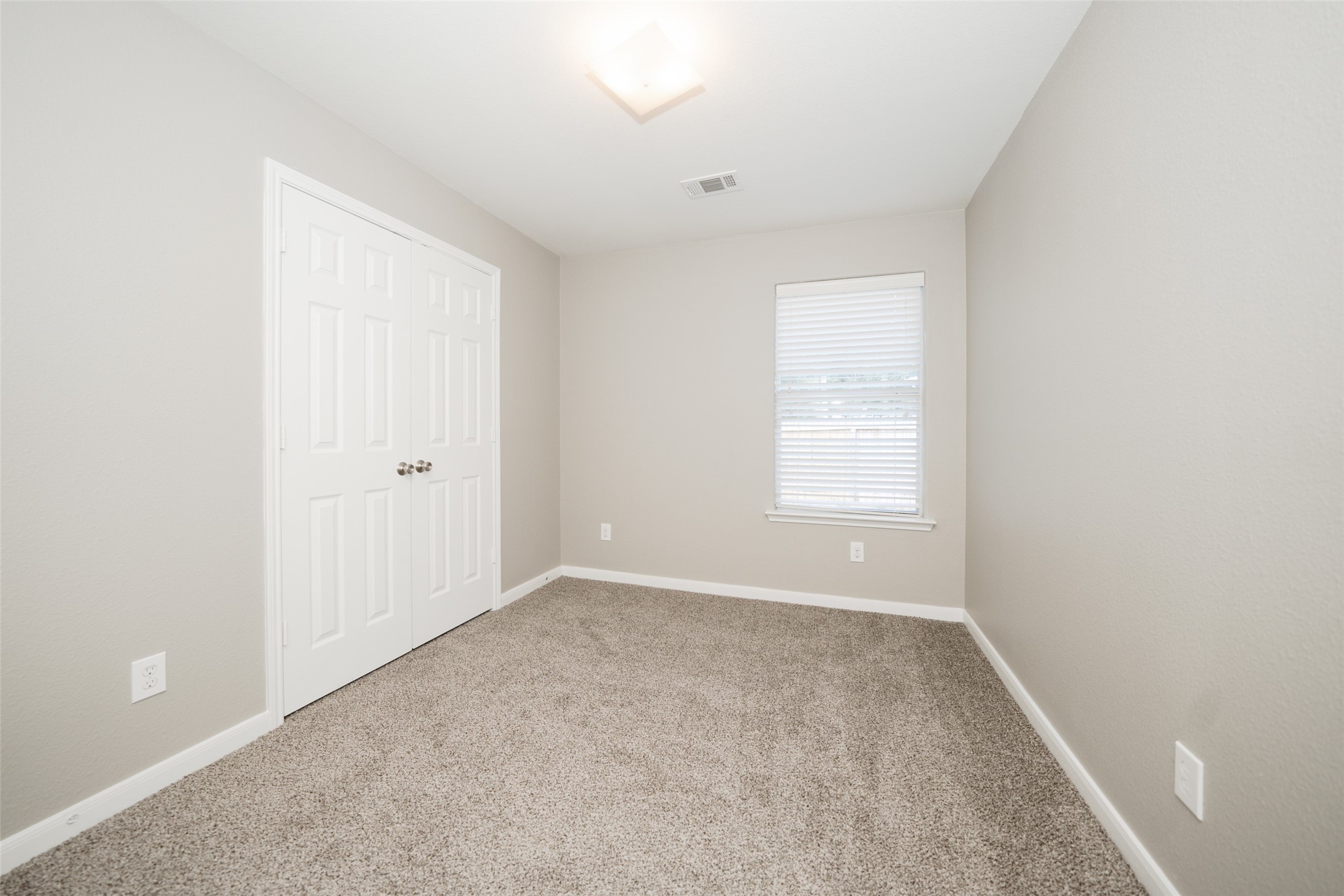 28894 Llano River Loop Spring, TX 77386 - Photo 21 of 33 a view of an empty room with a window