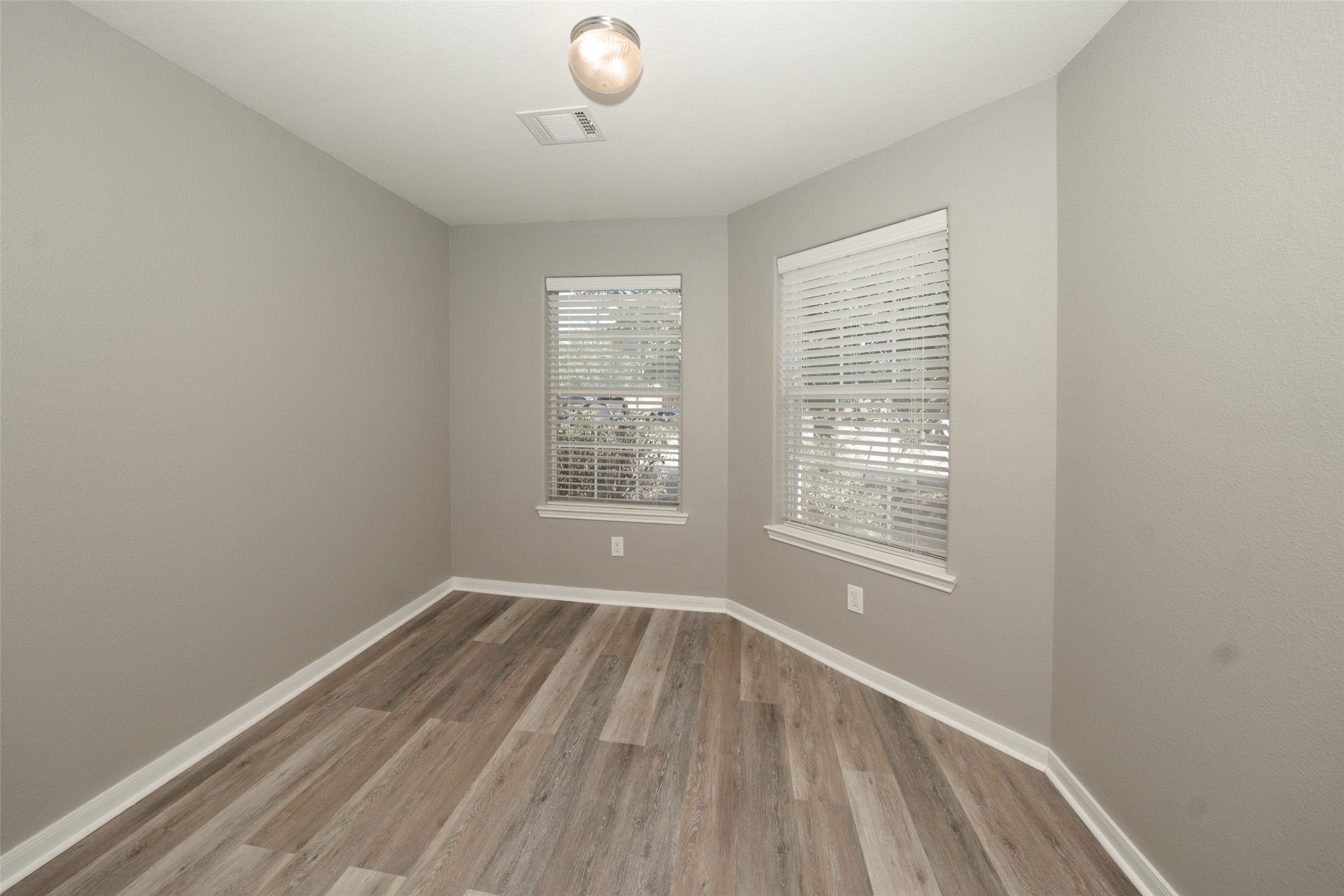 28894 Llano River Loop Spring, TX 77386 - Photo 27 of 33 wooden floor in an empty room with a window