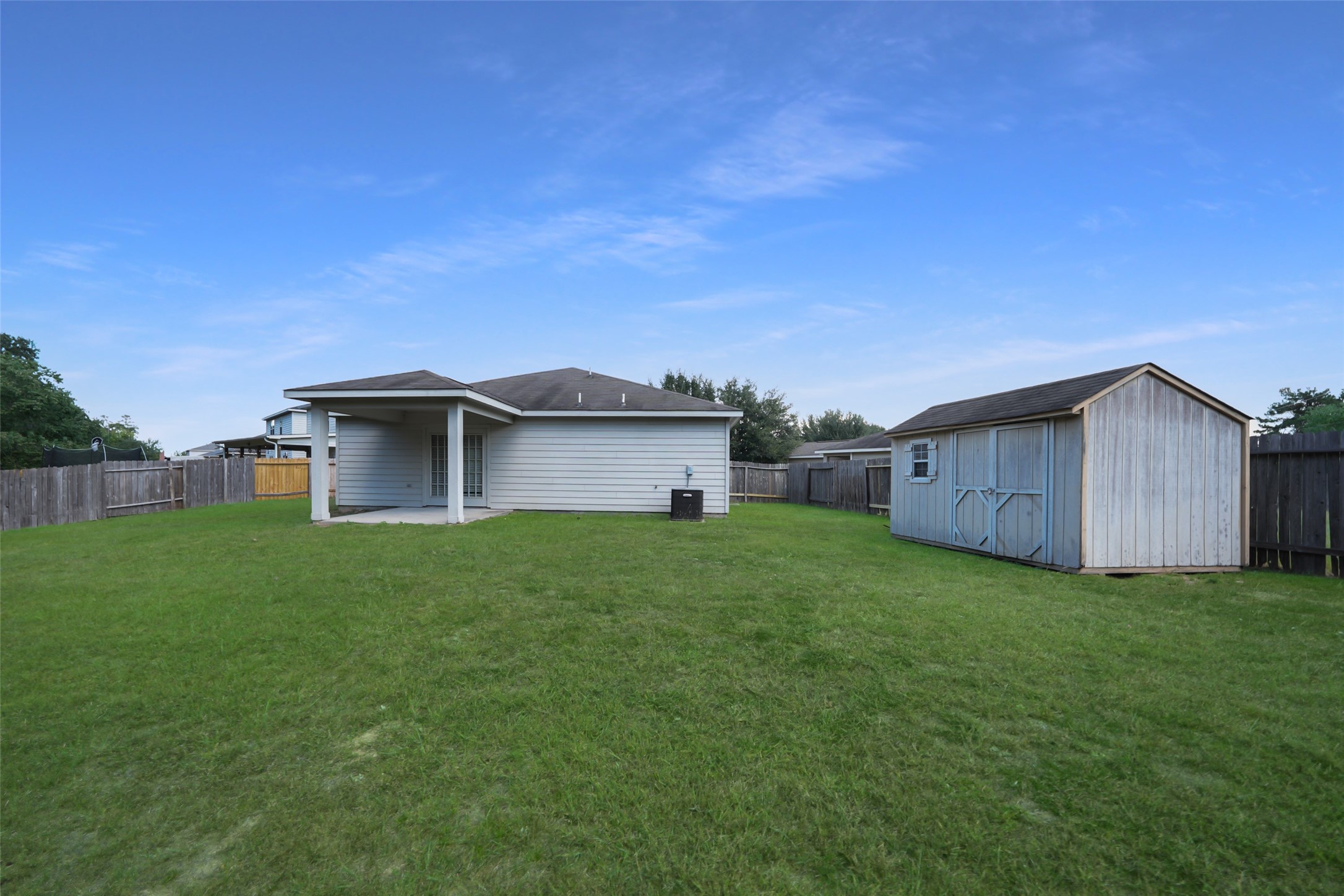 28894 Llano River Loop Spring, TX 77386 - Photo 28 of 33 a house that is sitting in the grass