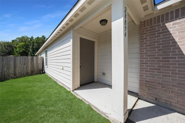 a view of a back yard of the house