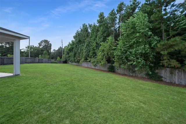 a view of a backyard with a garden