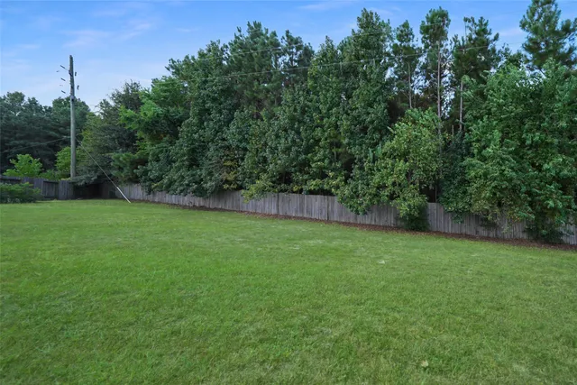 a view of a backyard with a garden