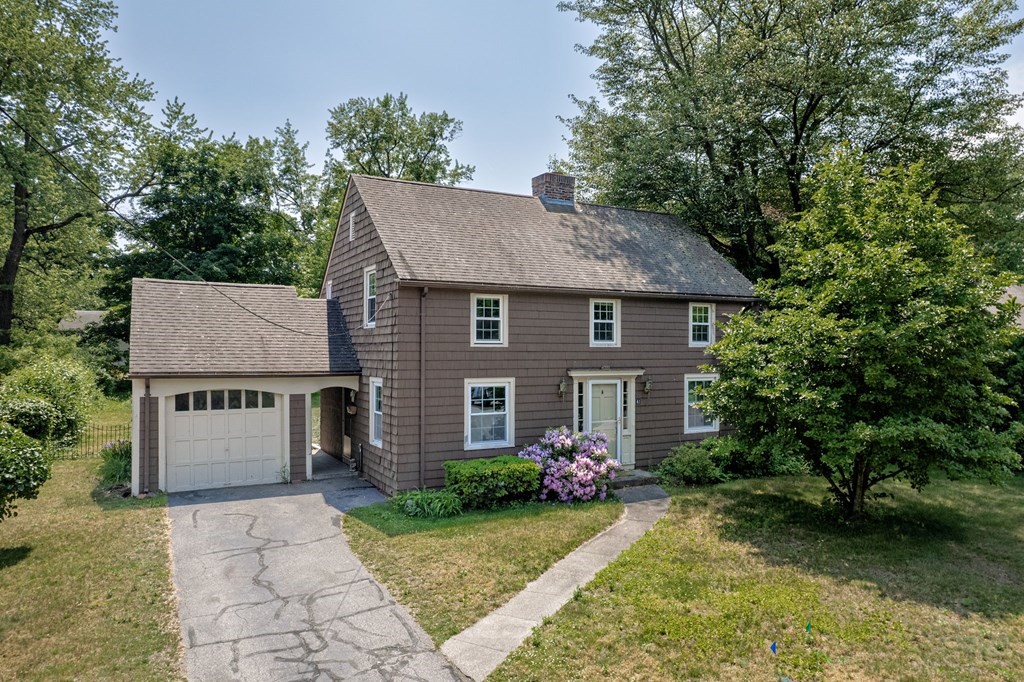 41 Cooley Drive Longmeadow, MA 01106 - Photo 1 of 30 a front view of a house with garden