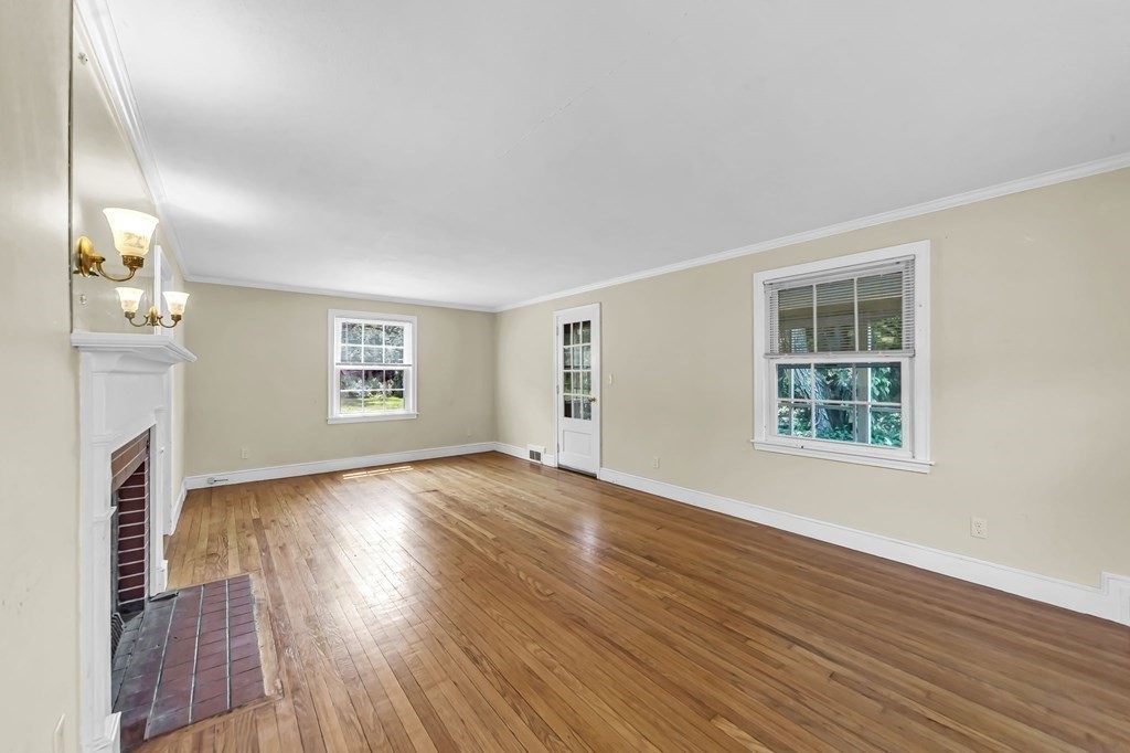 41 Cooley Drive Longmeadow, MA 01106 - Photo 20 of 30 an empty room with wooden floor and a window