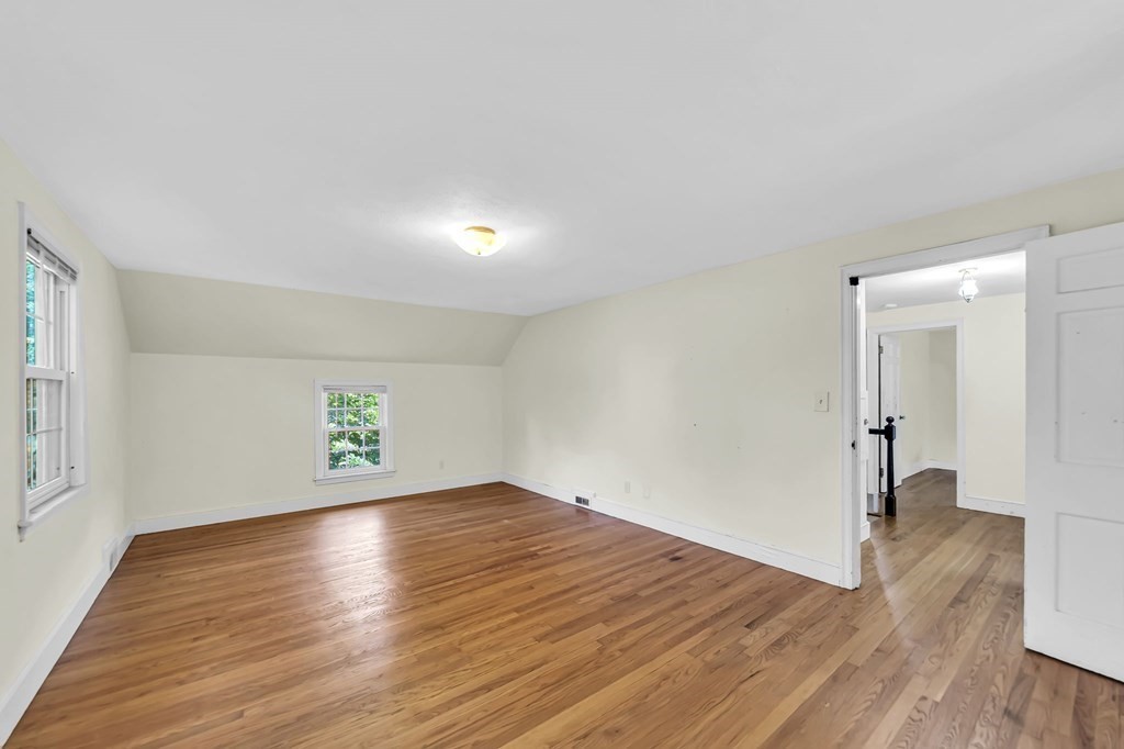 41 Cooley Drive Longmeadow, MA 01106 - Photo 22 of 30 a view of an empty room and wooden floor