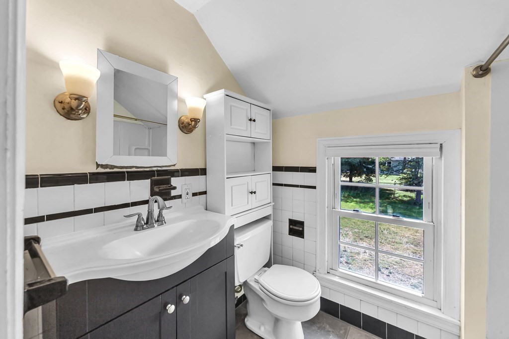 41 Cooley Drive Longmeadow, MA 01106 - Photo 26 of 30 a bathroom with 2 sink toilet and a mirror
