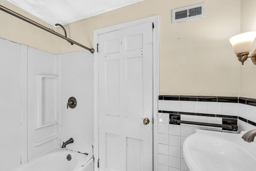 41 Cooley Drive Longmeadow, MA 01106 - Photo 27 of 30 a bathroom with a sink and a shower