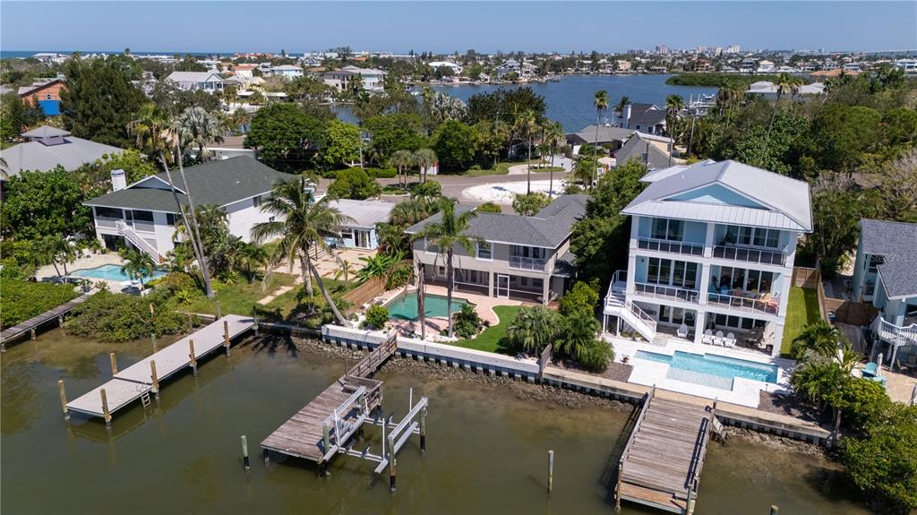333 12th Avenue Indian Rocks Beach, FL 33785 - Photo 54 of 64 an aerial view of residential houses with outdoor space and swimming pool