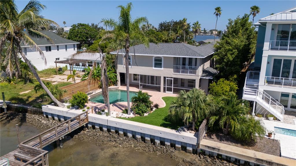 333 12th Avenue Indian Rocks Beach, FL 33785 - Photo 57 of 64 an aerial view of a house with a yard