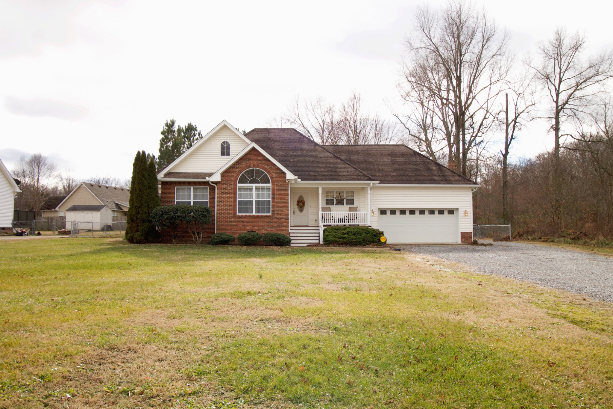476 Jim Courtney Road Portland, TN 37148 - Photo 1 of 18 a front view of a house with a big yard