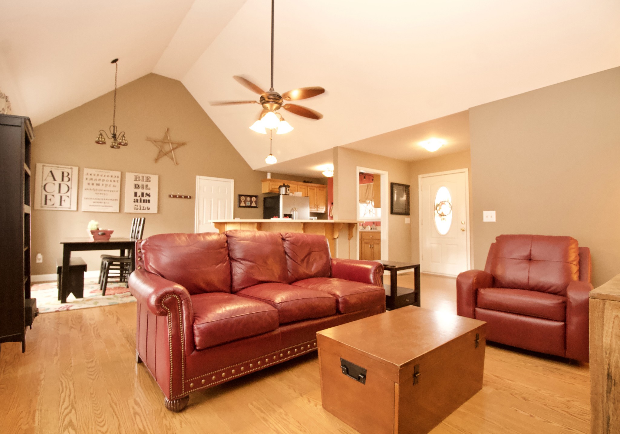 476 Jim Courtney Road Portland, TN 37148 - Photo 3 of 18 a living room with furniture ceiling fan and a rug