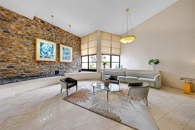 a view of a swimming pool with a lounge chair