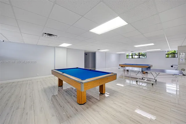 a view of swimming pool from a balcony