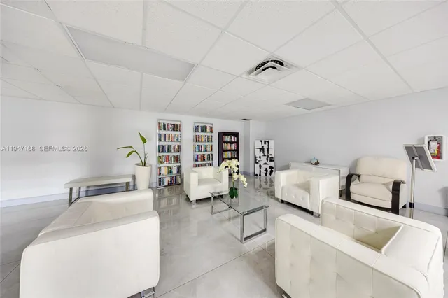 a view of a dining area with furniture window and outside view