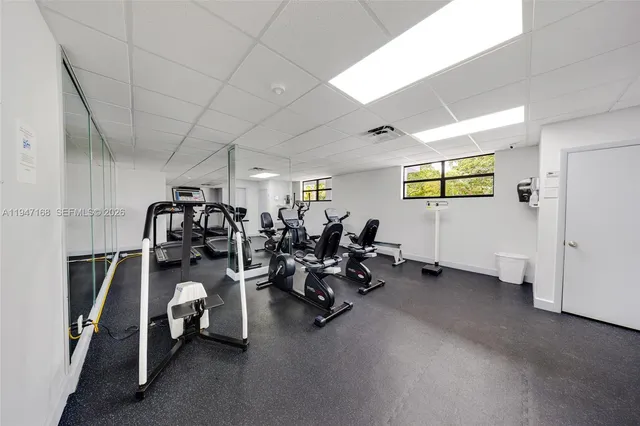 a view of a street with tall buildings