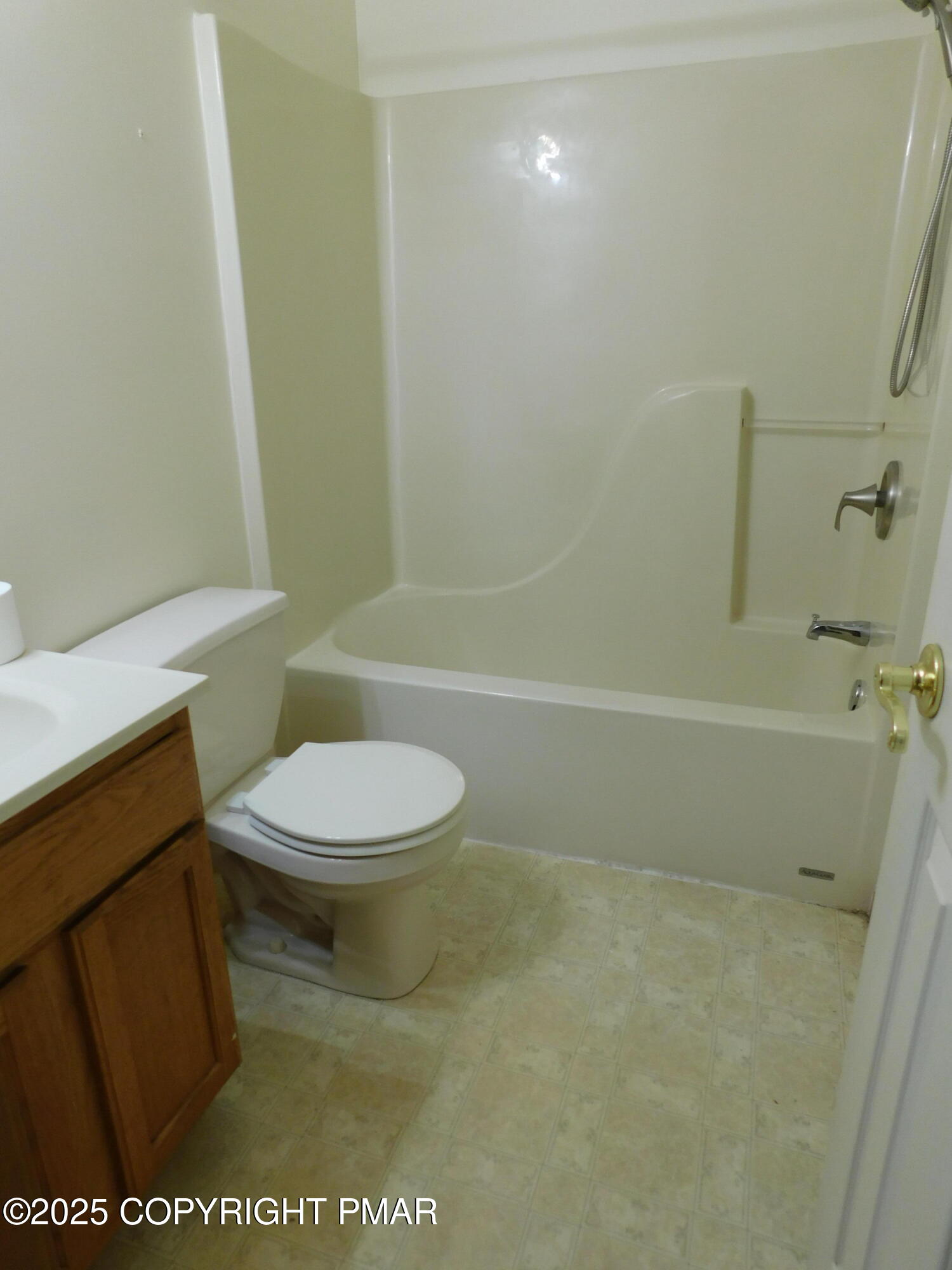 613 Country Acres Court Effort, PA 18330 - Photo 11 of 18 a white toilet sitting next to a bath tub
