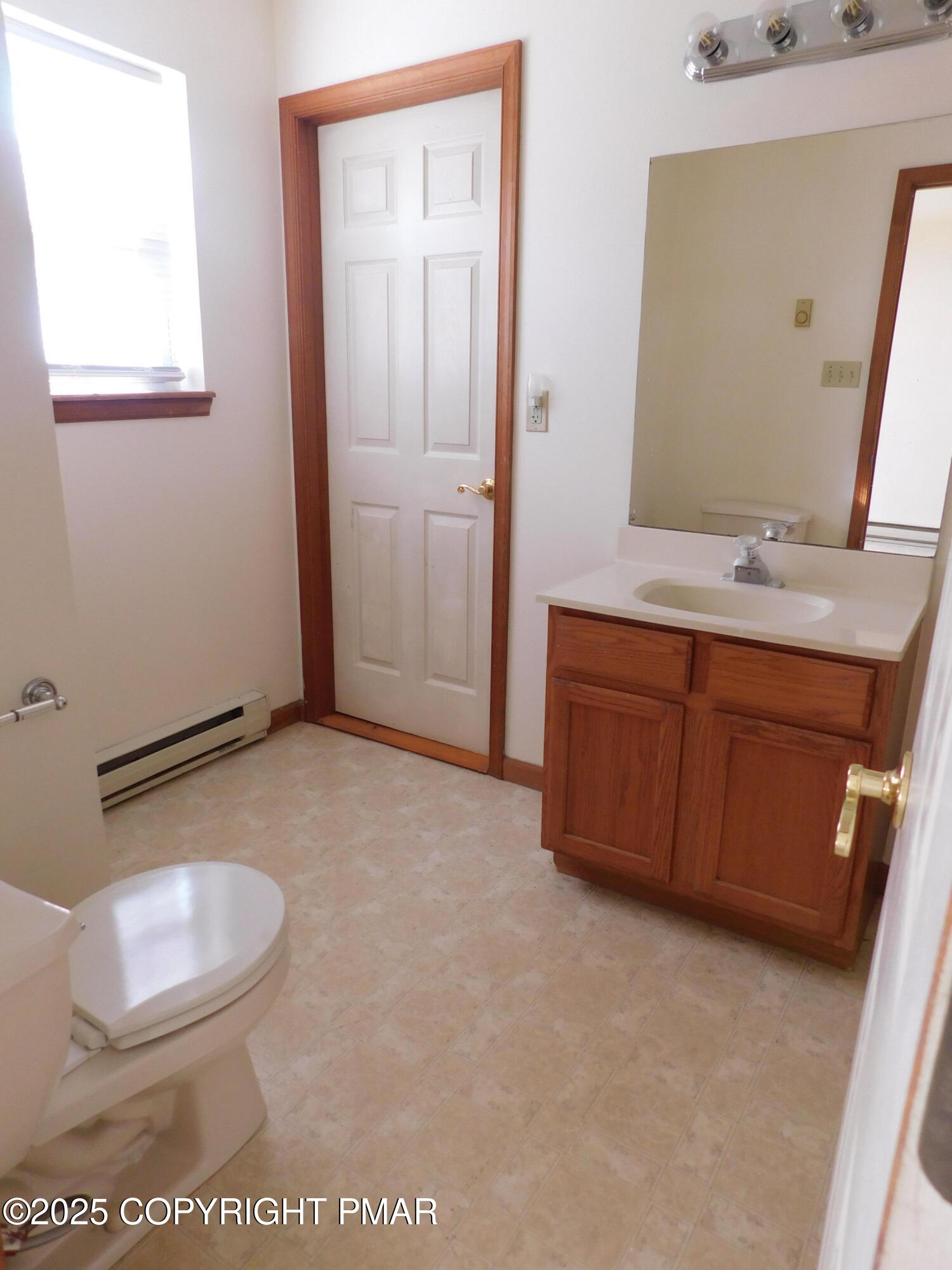 613 Country Acres Court Effort, PA 18330 - Photo 8 of 18 a bathroom with a sink a toilet and mirror