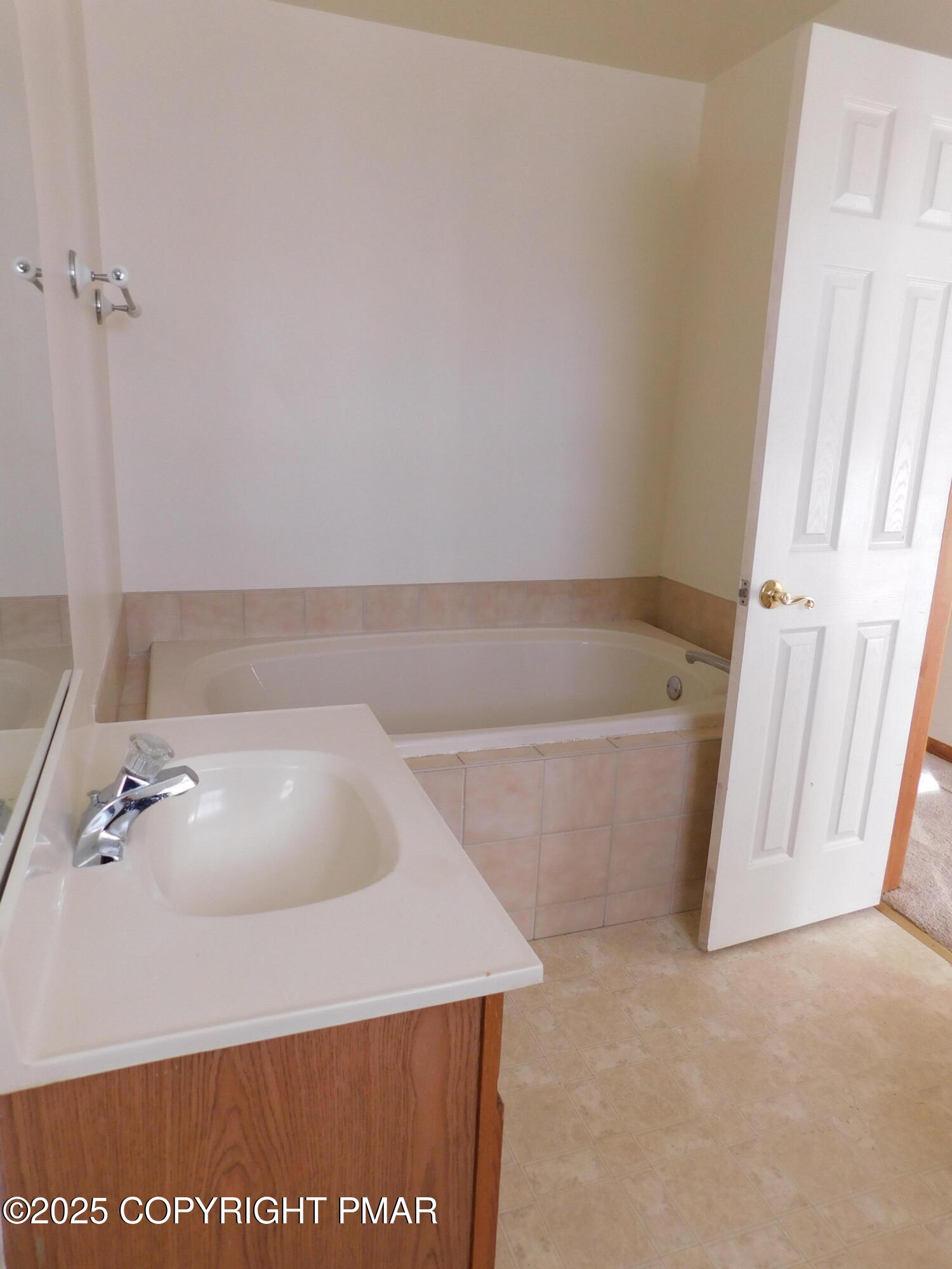 613 Country Acres Court Effort, PA 18330 - Photo 9 of 18 a bath tub sitting next to a white sink