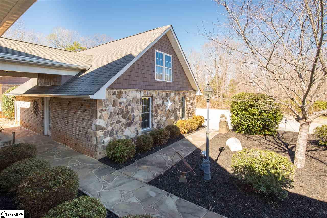 175 Waters Road Taylors, SC 29687 - Photo 24 of 36 Outside of Garage with Stone /Flagstar Walkways that to lead to Guest House