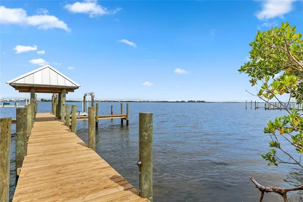 a view of balcony with deck and wooden floor