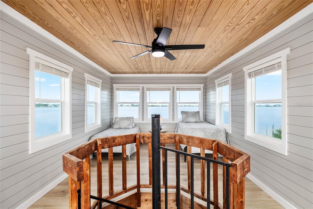 8772 Little Gasparilla Placida, FL 33946 - Photo 39 of 54 a view of a dining room with furniture window and wooden floor