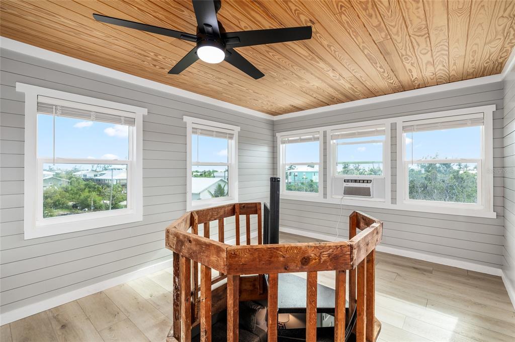 8772 Little Gasparilla Placida, FL 33946 - Photo 40 of 54 a view of a dining room with furniture window and outside view