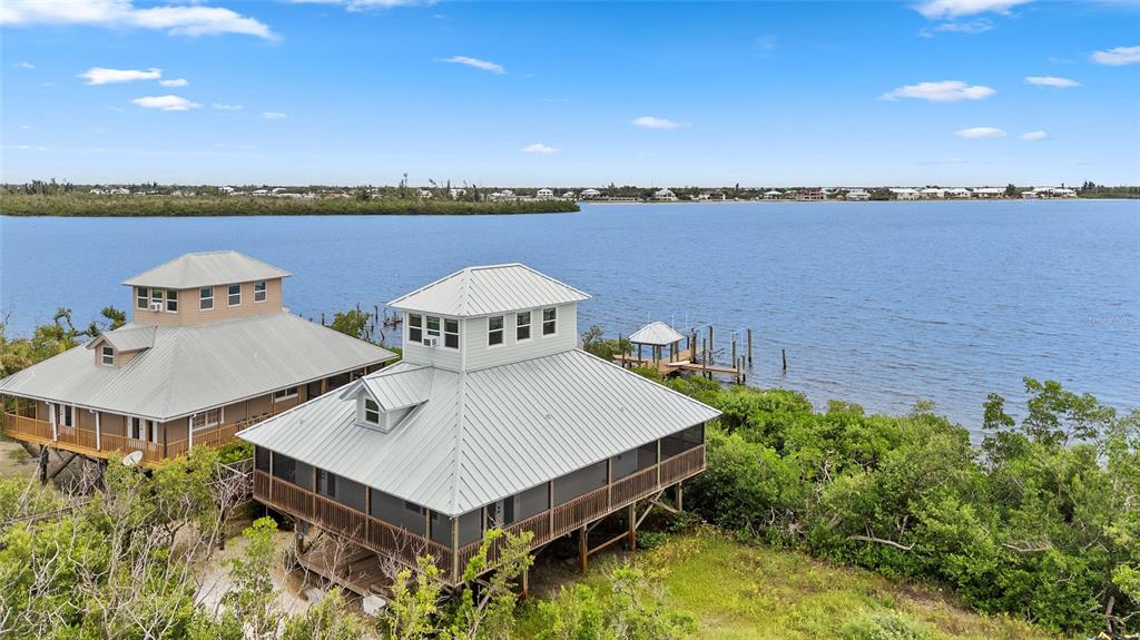 8772 Little Gasparilla Placida, FL 33946 - Photo 4 of 54 a view of a terrace with sitting area