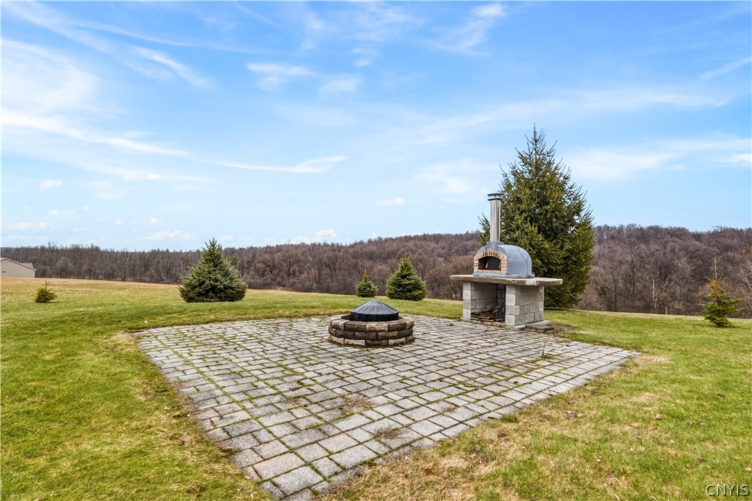 4448 Bussey Road Onondaga, NY 13215 - Photo 3 of 21 Outdoor fire pit and oven
