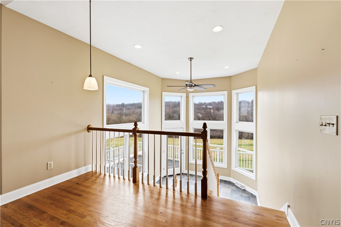 4448 Bussey Road Onondaga, NY 13215 - Photo 6 of 21 Open sunroom to lower level