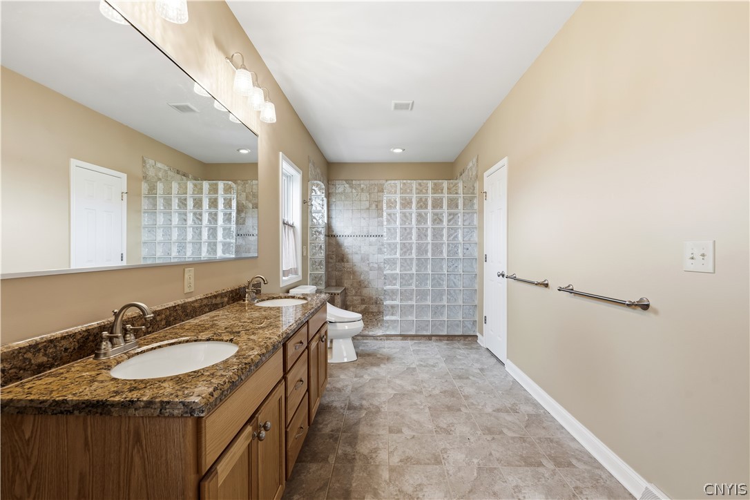 4448 Bussey Road Onondaga, NY 13215 - Photo 9 of 21 Primary Spa Bathroom