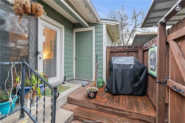 a view of balcony with furniture