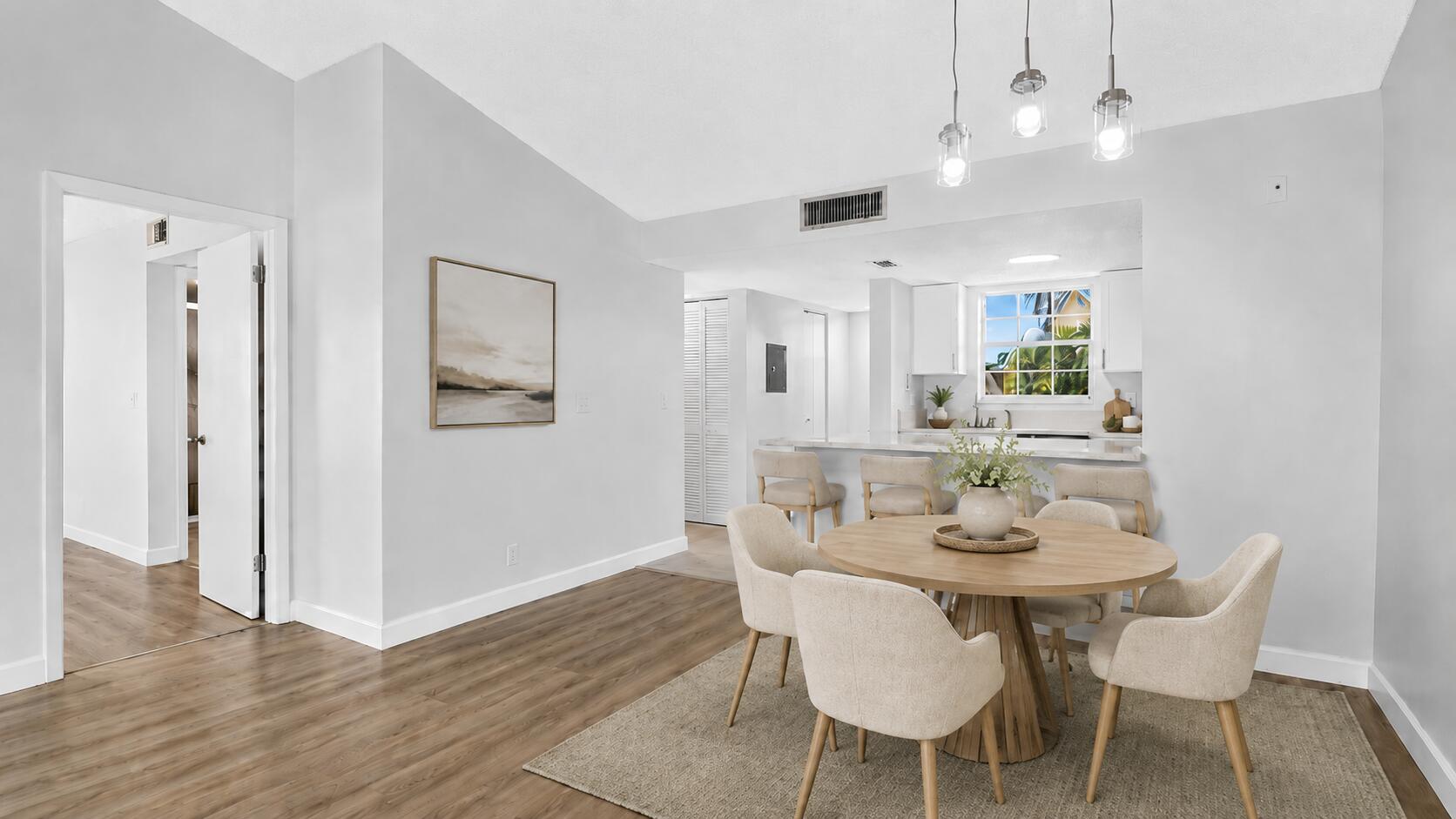 6323 La Costa Drive, Unit M Boca Raton, FL 33433 - Photo 11 of 33 dining area virtually staged